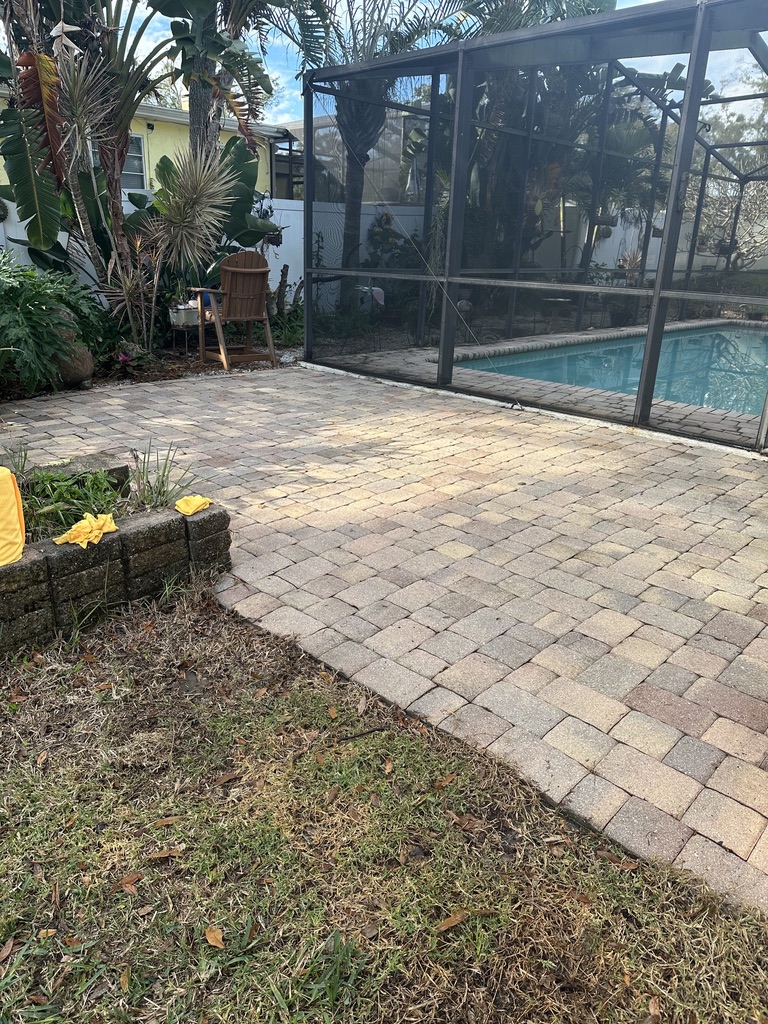 Backyard patio pavers clean and restored after service
